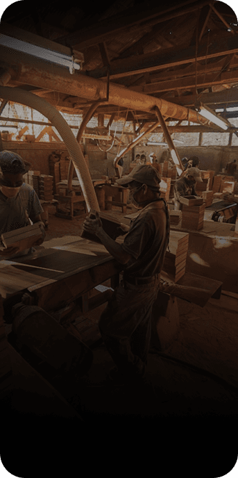 Guarented craftsmen building furniture in the factory