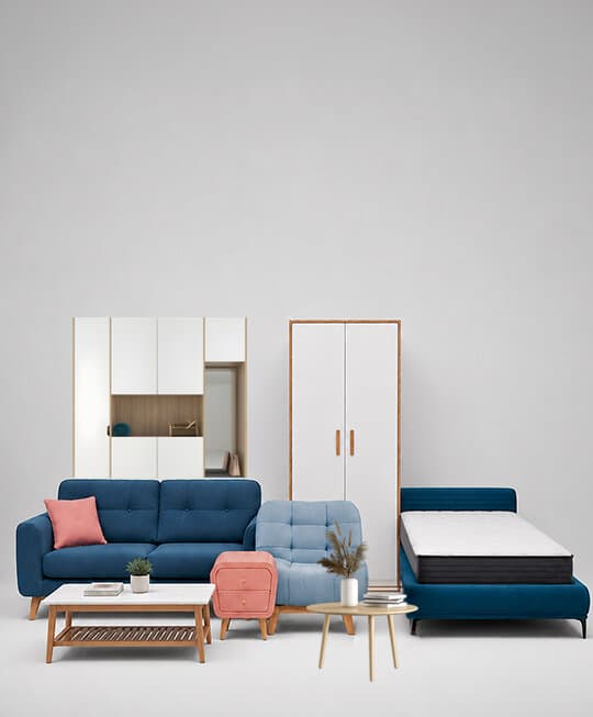 A collection of rental furniture — sofas, chairs, tables and a wardrobe